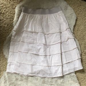 Really cute white ruffle tiered skirt from Anthro